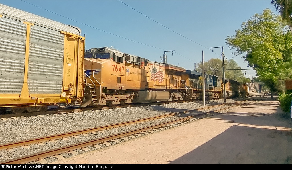 UP & CSX Locomotives leading a train